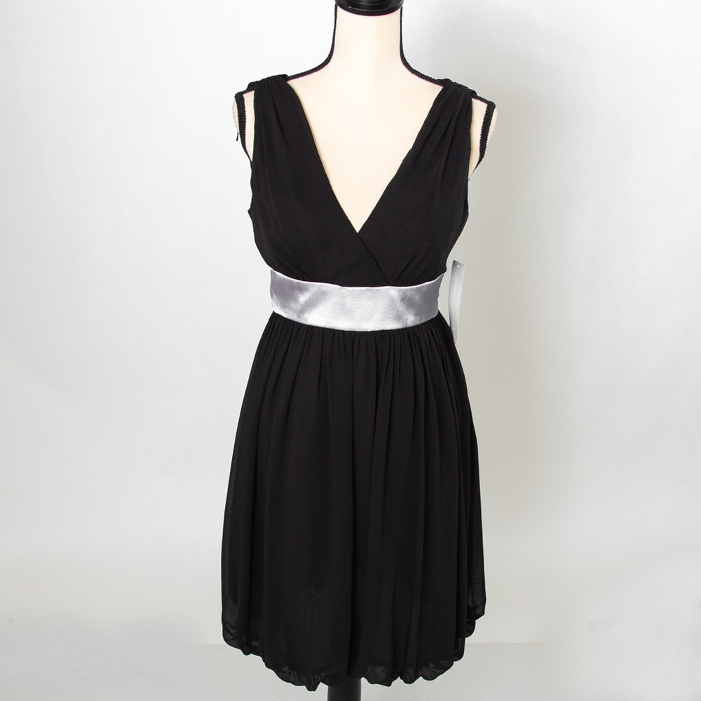Little black dress sleeveless silky silver bow in back London Times 8
